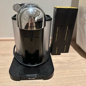 breville vertuo with two nespresso pod sleeves